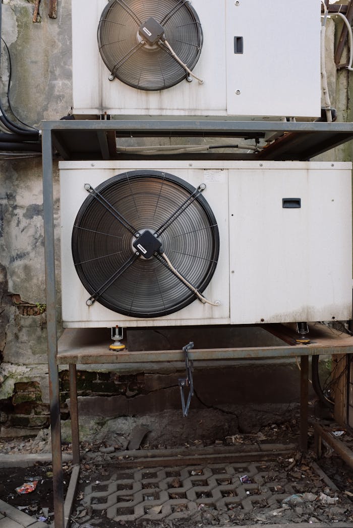 journey Compressors in white casings running on full power while installed outside of building